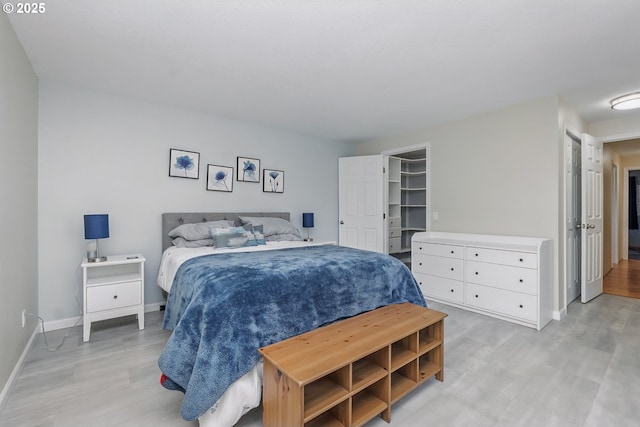 5355 SW 205th Ct, Beaverton, OR 97078 - bedroom featuring light wood-type flooring and baseboards