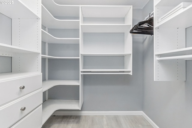 5355 SW 205th Ct, Beaverton, OR 97078 - walk in closet featuring wood finished floors