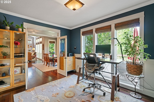 home office featuring ornamental molding and dark wood finished floors