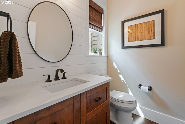 half bath with toilet and vanity