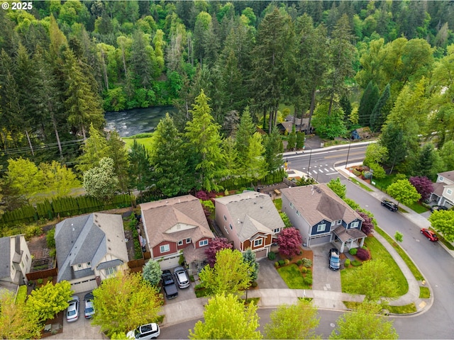 aerial view with a view of trees and a residential view