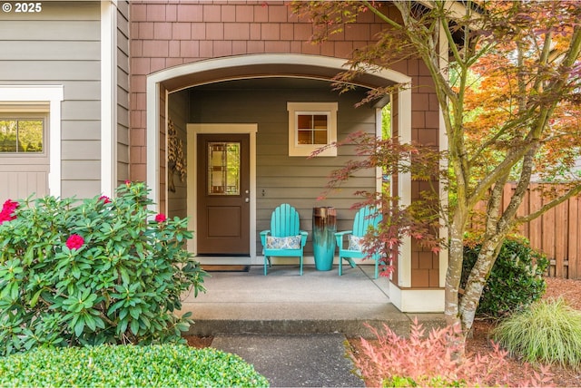 1043 Meek Way W, Linn, OR 97068 - doorway to property featuring covered porch and fence