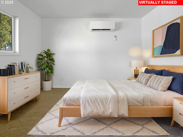 bedroom featuring an AC wall unit