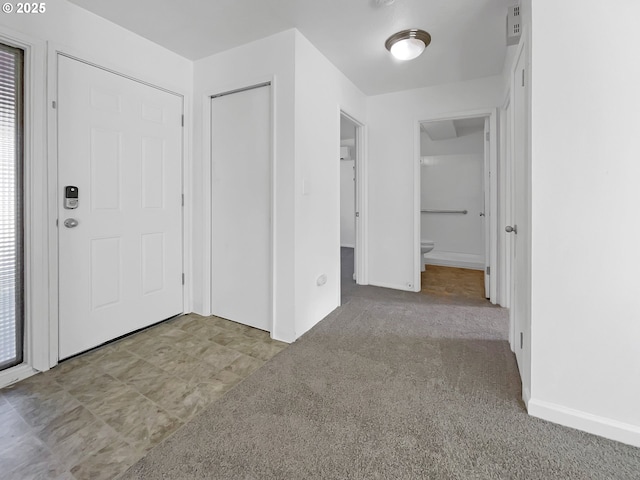 entryway featuring carpet