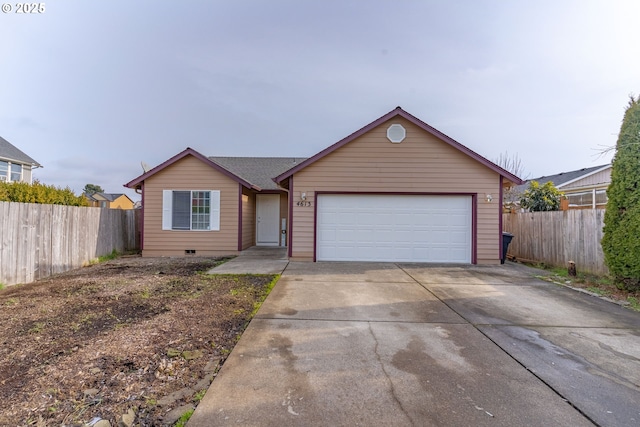 single story home featuring a garage