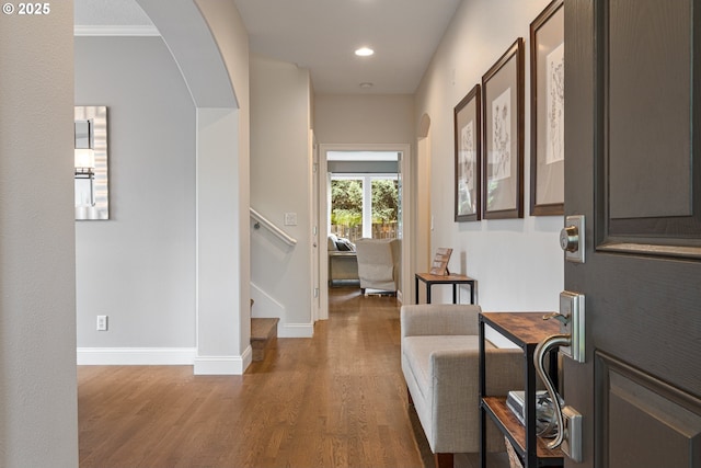 352 SE 14th Pl, Canby, OR 97013 - hall featuring wood finished floors, arched walkways, recessed lighting, stairway, and baseboards