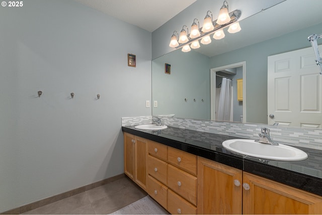 352 SE 14th Pl, Canby, OR 97013 - bathroom with double vanity, tile patterned floors, and baseboards