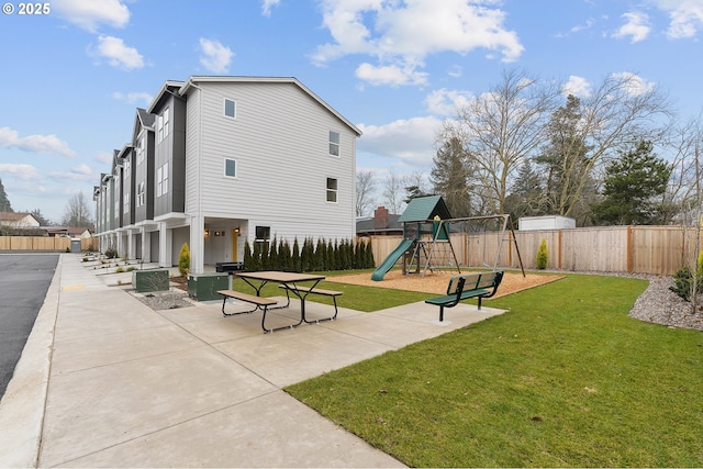 15091 SE Division St, Portland, OR 97236 - view of side of property with a patio area