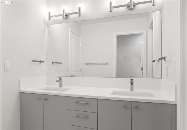 bathroom featuring double vanity