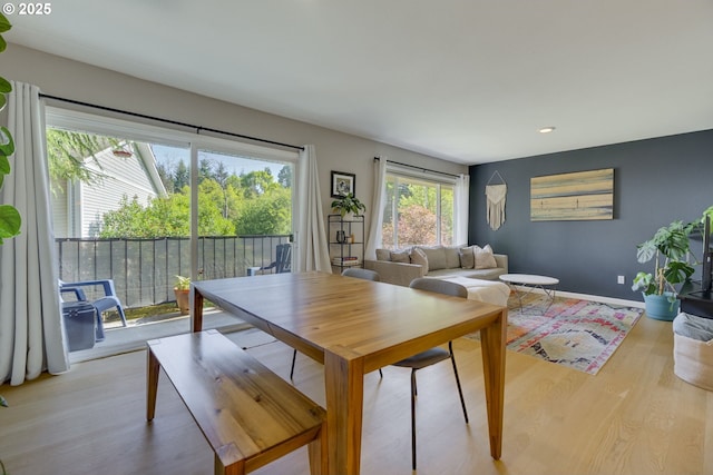 6825 SW Capitol Hill Rd Unit 27, Portland, OR 97219 - dining area featuring light wood-type flooring and recessed lighting