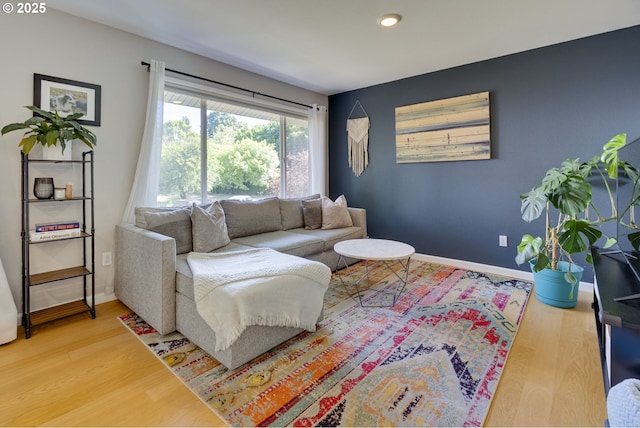 6825 SW Capitol Hill Rd Unit 27, Portland, OR 97219 - living room featuring wood finished floors and recessed lighting
