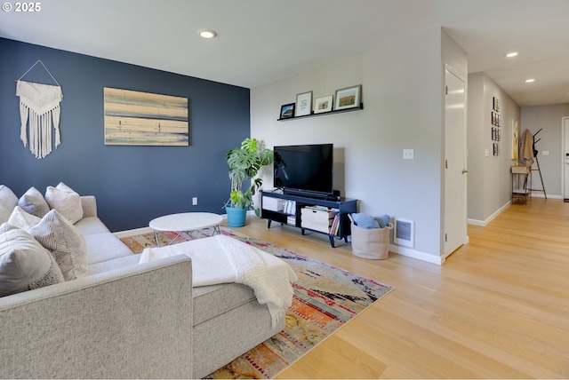 6825 SW Capitol Hill Rd Unit 27, Portland, OR 97219 - living room with wood finished floors and recessed lighting