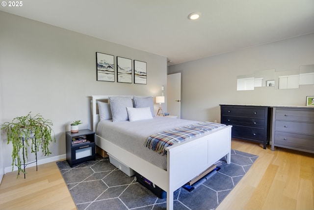 6825 SW Capitol Hill Rd Unit 27, Portland, OR 97219 - bedroom featuring wood finished floors and recessed lighting