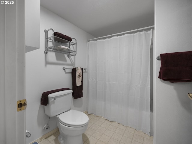 bathroom featuring toilet