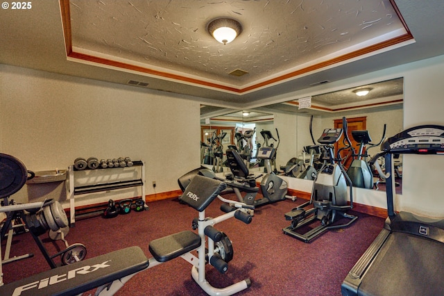 14019 NE 20th Ave Unit E44, Vancouver, WA 98686 - workout area with a raised ceiling, baseboards, a textured ceiling, and carpet floors