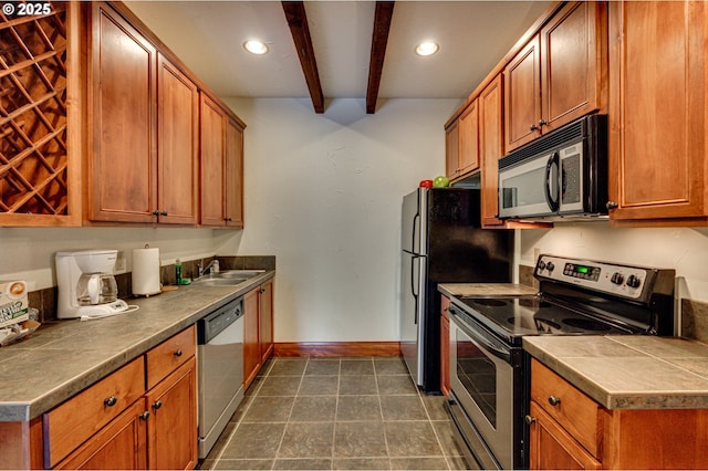 14019 NE 20th Ave Unit E44, Vancouver, WA 98686 - kitchen featuring appliances with stainless steel finishes, beamed ceiling, baseboards, recessed lighting, and brown cabinetry