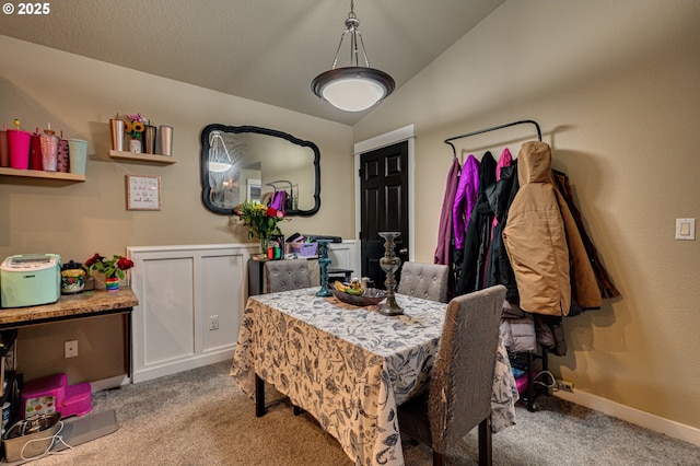 14019 NE 20th Ave Unit E44, Vancouver, WA 98686 - carpeted dining space with lofted ceiling and baseboards