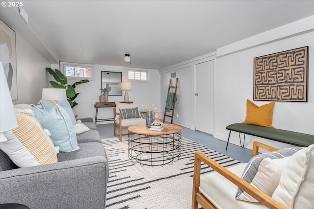 living room with finished concrete flooring