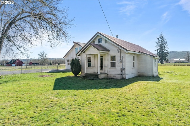 bungalow with crawl space and a front lawn