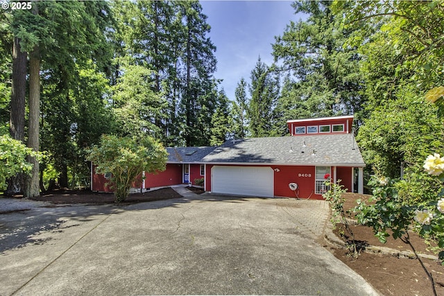 9403 SW 74th Ave, Portland, OR 97223 - mid-century inspired home with driveway and a garage