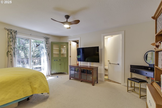 9403 SW 74th Ave, Portland, OR 97223 - bedroom featuring light colored carpet, ensuite bathroom, a textured ceiling, and ceiling fan