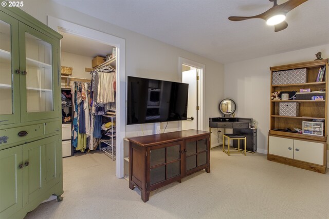 9403 SW 74th Ave, Portland, OR 97223 - living area with light colored carpet and a ceiling fan