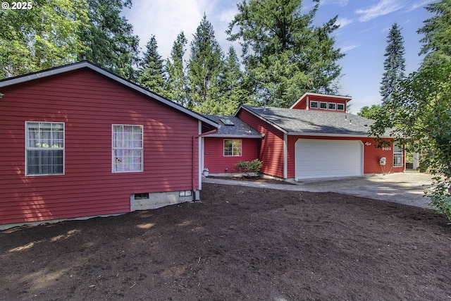 9403 SW 74th Ave, Portland, OR 97223 - view of front of house with a garage, driveway, and roof with shingles
