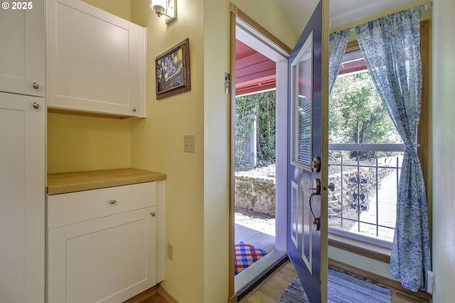 9403 SW 74th Ave, Portland, OR 97223 - doorway to outside featuring light wood-type flooring