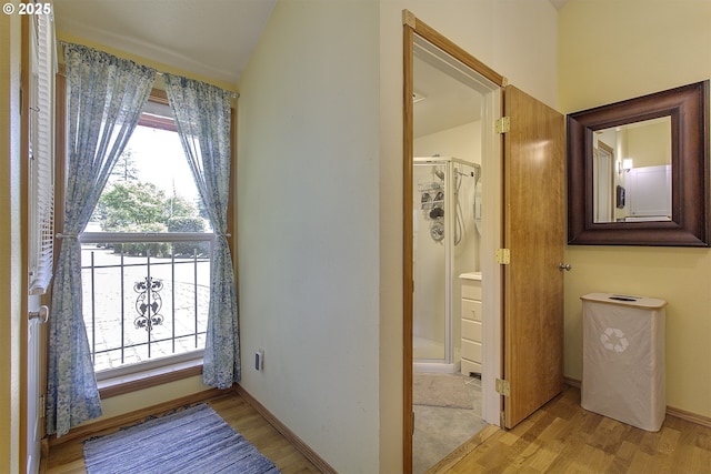 9403 SW 74th Ave, Portland, OR 97223 - full bathroom featuring a shower stall, wood finished floors, and vaulted ceiling
