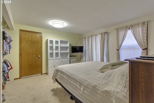 9403 SW 74th Ave, Portland, OR 97223 - bedroom featuring light colored carpet and a textured ceiling