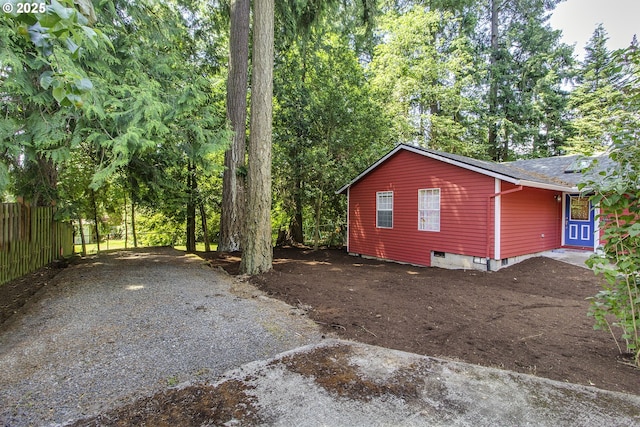 9403 SW 74th Ave, Portland, OR 97223 - view of home's exterior with roof with shingles and driveway