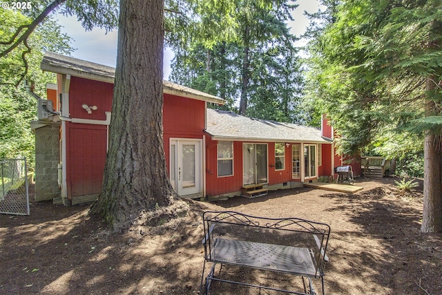9403 SW 74th Ave, Portland, OR 97223 - rear view of property featuring a wooden deck and roof with shingles