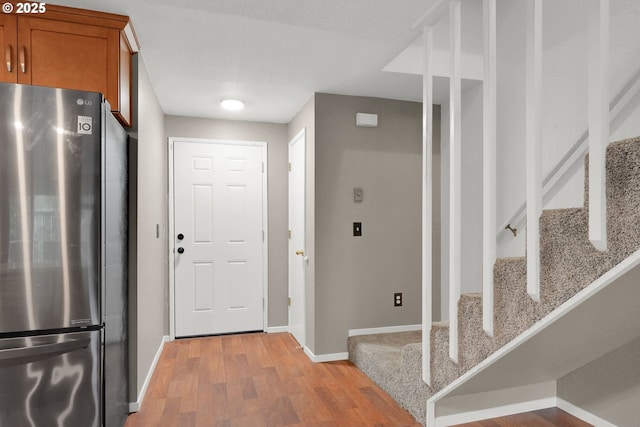 entryway with light wood-type flooring