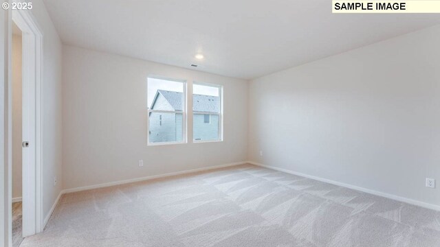 2124 NE 3rd Ave, Battle Ground, WA 98604 - unfurnished room featuring light colored carpet and baseboards