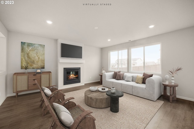 living room with dark wood-type flooring