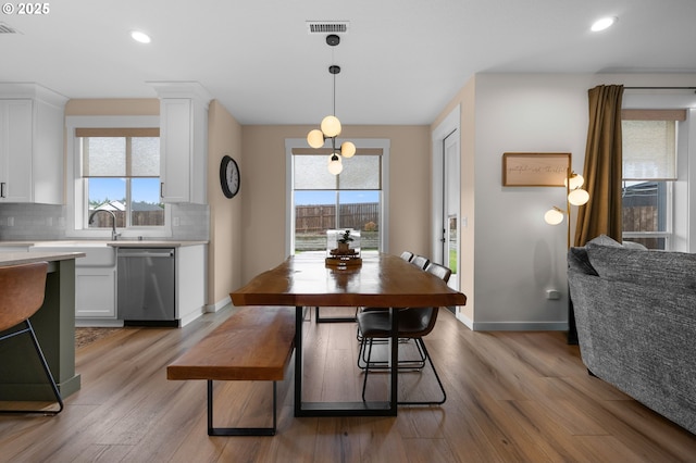 3838 SE 7th Ave, Battle Ground, WA 98604 - dining area with light wood-type flooring, healthy amount of natural light, recessed lighting, and baseboards