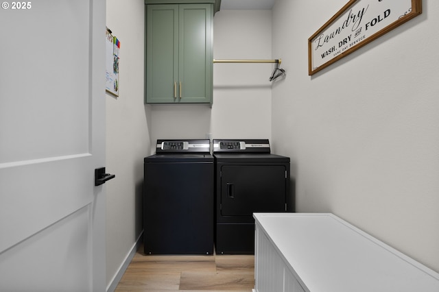 3838 SE 7th Ave, Battle Ground, WA 98604 - laundry room featuring cabinet space, separate washer and dryer, light wood finished floors, and baseboards