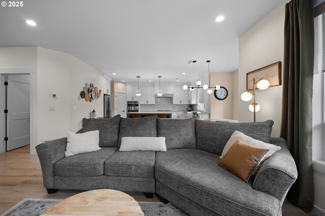 3838 SE 7th Ave, Battle Ground, WA 98604 - living area with wood finished floors and recessed lighting