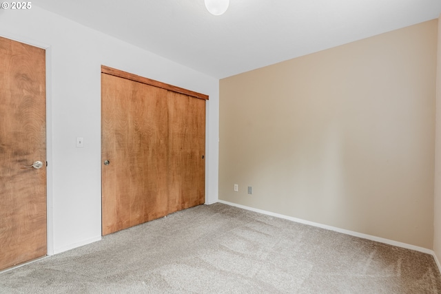 19686 Sun Cir, West Linn, OR 97068 - unfurnished bedroom with carpet floors, a closet, and baseboards