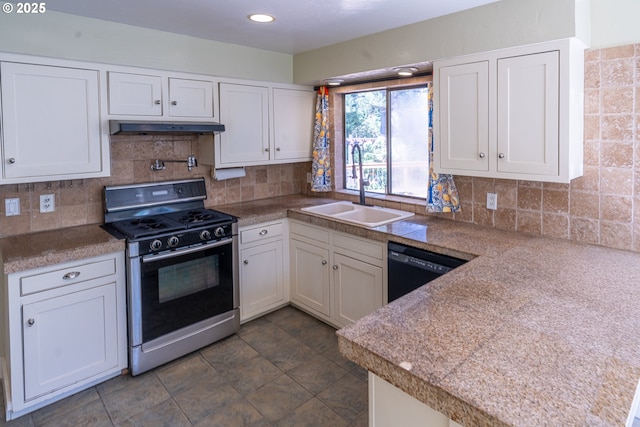 kitchen featuring under cabinet range hood, black appliances, a sink, white cabinetry, and tile countertops