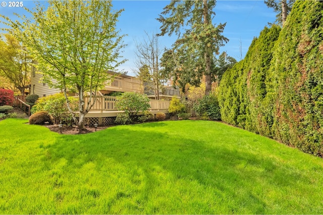 18005 SW Monte Verdi Blvd, Beaverton, OR 97007 - view of grassy yard featuring a deck