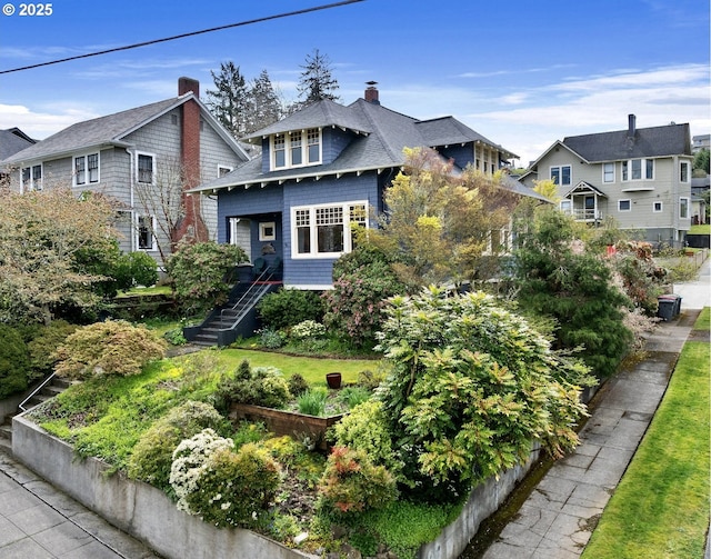 1219 Jerome Ave, Astoria, OR 97103 - view of front of home featuring stairs and a chimney