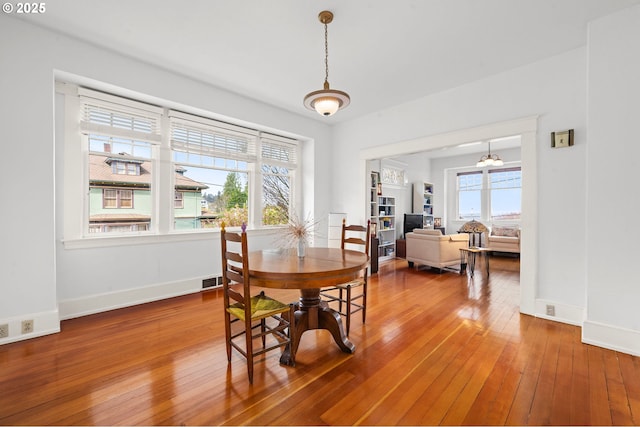 1219 Jerome Ave, Astoria, OR 97103 - dining area with hardwood / wood-style floors and baseboards