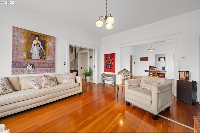 1219 Jerome Ave, Astoria, OR 97103 - living area with a notable chandelier and hardwood / wood-style flooring
