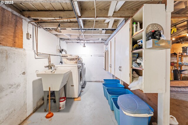 1219 Jerome Ave, Astoria, OR 97103 - unfinished basement featuring washing machine and clothes dryer