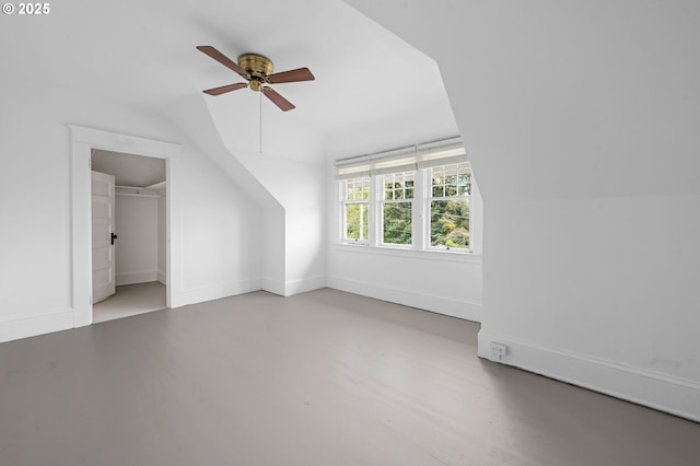 1219 Jerome Ave, Astoria, OR 97103 - bonus room featuring finished concrete floors, baseboards, vaulted ceiling, and ceiling fan