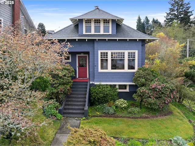 1219 Jerome Ave, Astoria, OR 97103 - view of front of home with a shingled roof, a front lawn, and stairs