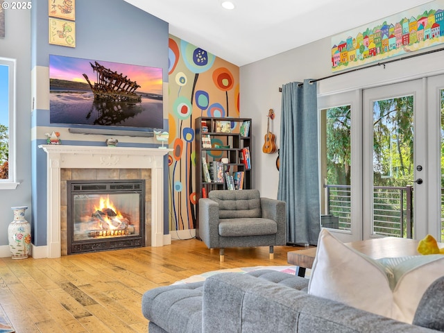 104 S Pl, Astoria, OR 97103 - living room with a tiled fireplace, hardwood / wood-style floors, and recessed lighting