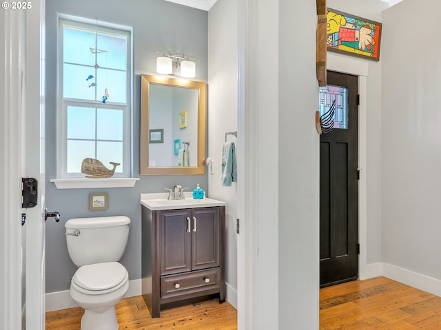 104 S Pl, Astoria, OR 97103 - bathroom with vanity and hardwood / wood-style floors