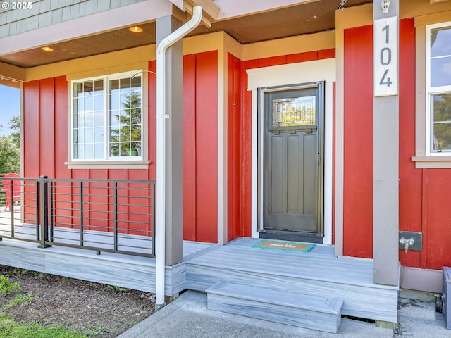 104 S Pl, Astoria, OR 97103 - view of exterior entry featuring board and batten siding and a porch